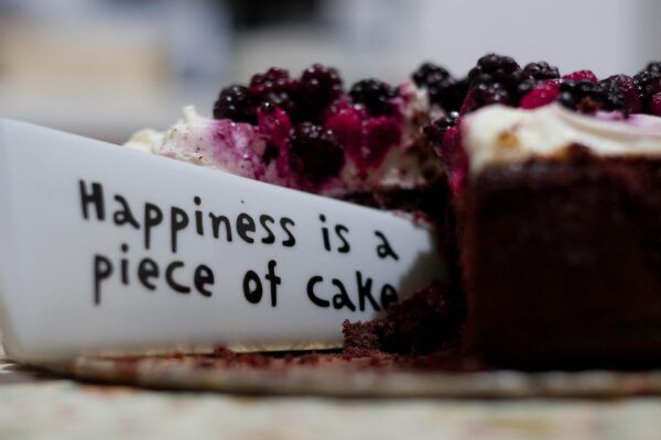 George Harrison Quote: “All the world is birthday cake, so take a piece,  but not too much.”